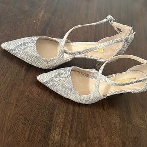 Louise et Cie snakeskin Pumps.